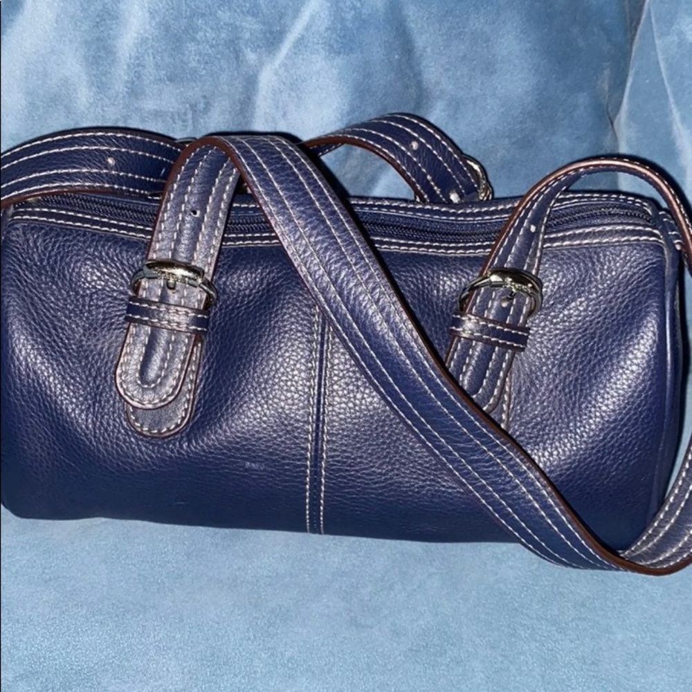Blue Tignanello barrel purse